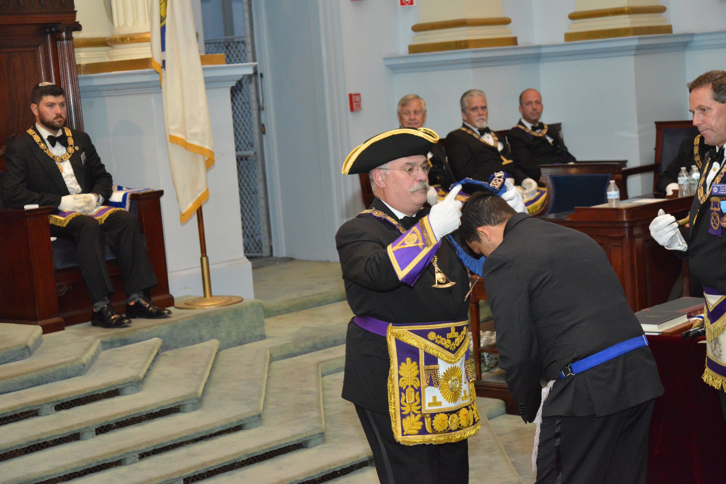  The Grand Master investing the Worshipful Master with the jewel of his office, the Square 