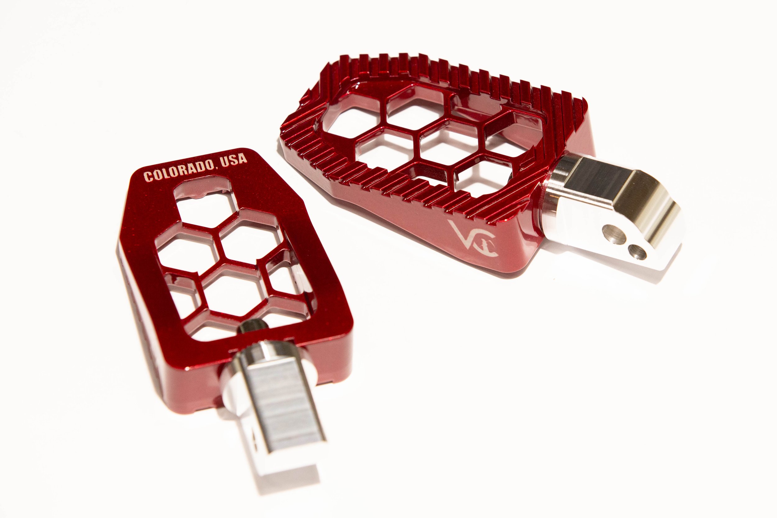 Vengeance Customs passenger footpegs for 2018+ Harley-Davidson Softail in Red Ritual Finish, installed on motorcycle