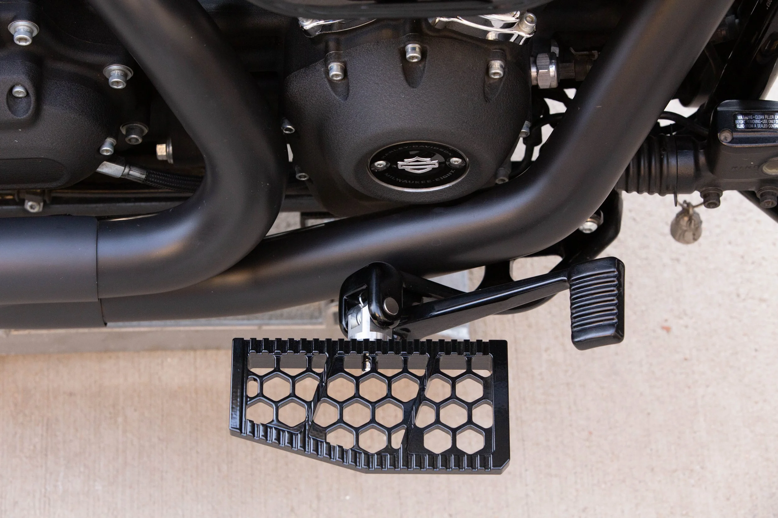 Vengeance Customs rider floorboards for 2018+ Harley-Davidson Softail in Black Eclipse, installed on motorcycle