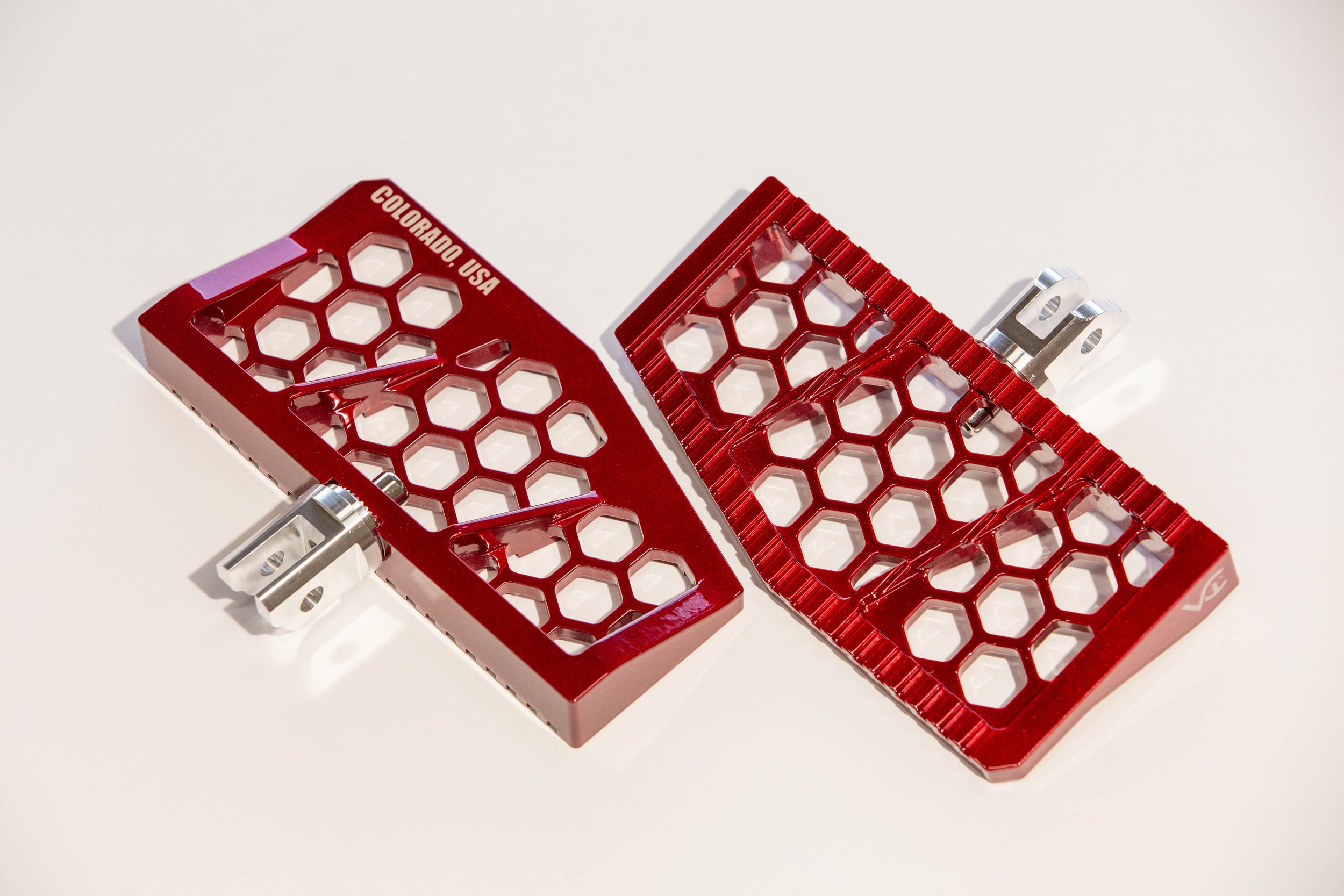 Vengeance Customs rider floorboards for 2018+ Harley-Davidson Softail in Red Ritual Finish, installed on motorcycle