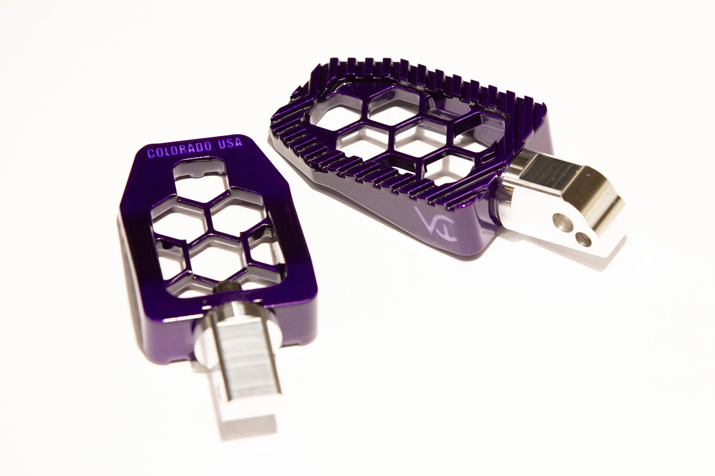 Vengeance Customs passenger footpegs for 2018+ Harley-Davidson Softail in Purple Oblivion Finish, installed on motorcycle