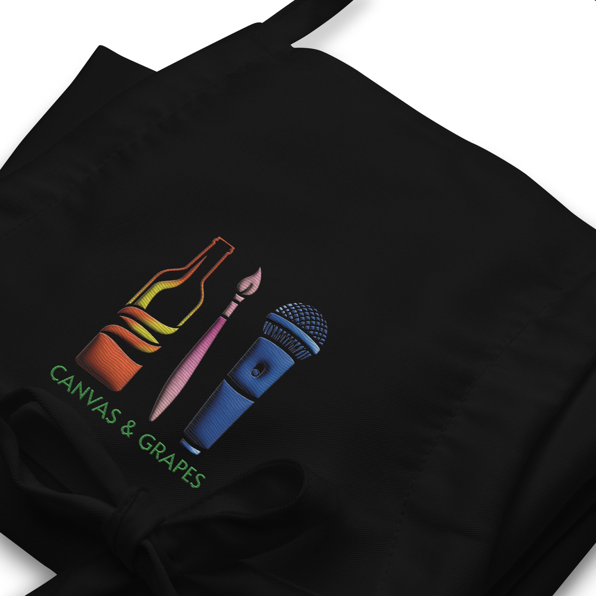 embroidered-apron-black-zoomed-in-66f36f7c1432d.jpg