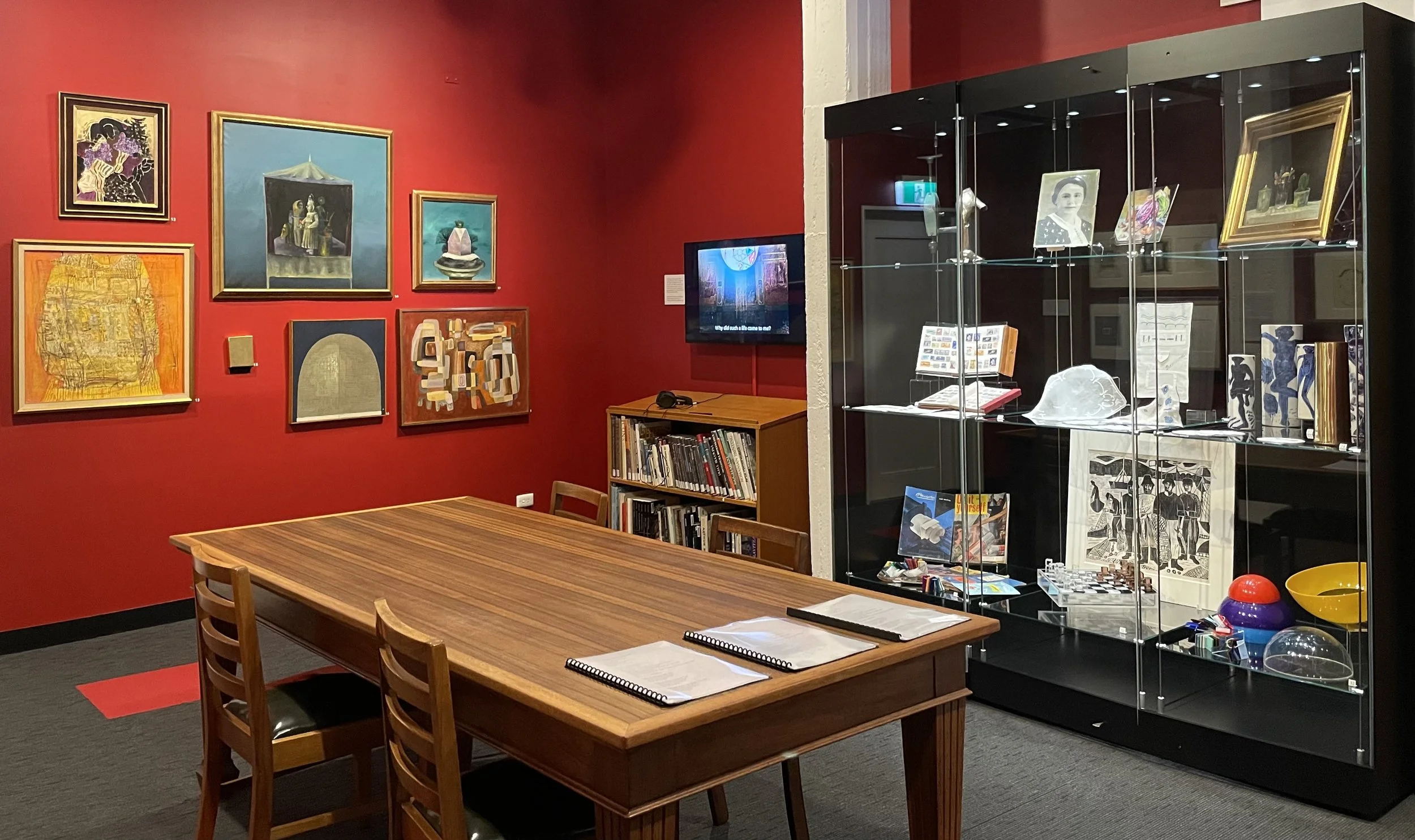 Installation shot: Curiosity cabinet and Tyler Collection paintings by Stefan Caltia, Georgeta Naparus, Marin Gherasim, Gheorge Saru, Silvia Radu. Short film by Naomi Ullmann 2026