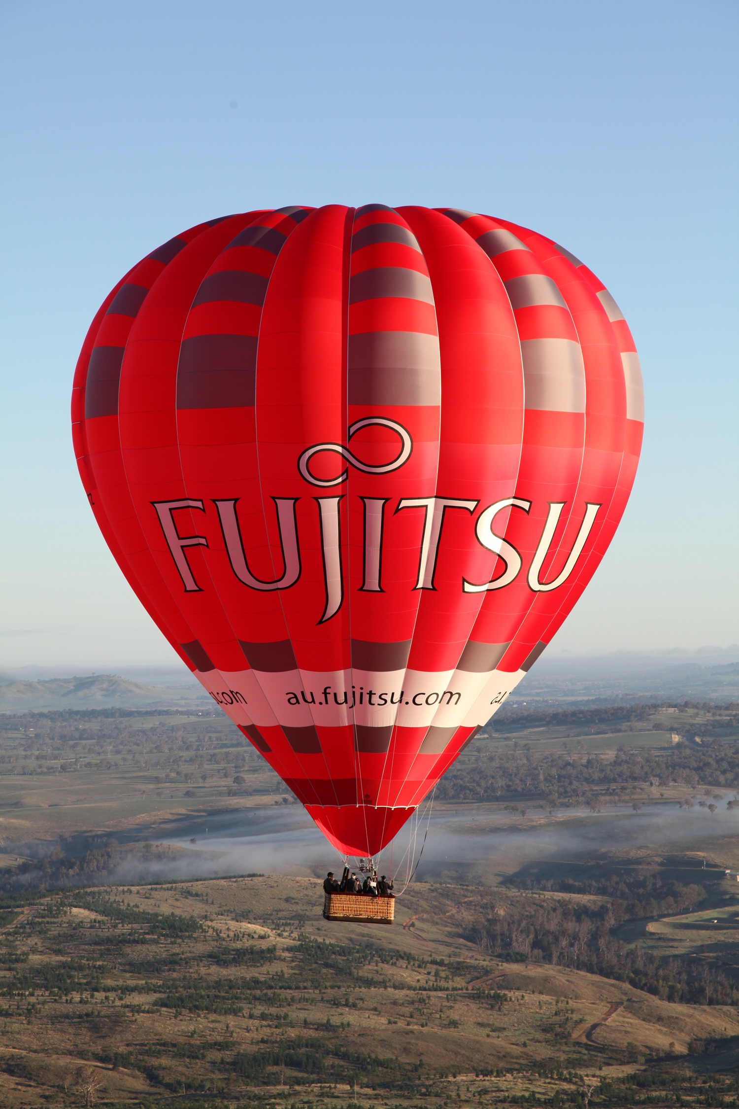 Fujitsu hot air balloon over countryside.jpeg