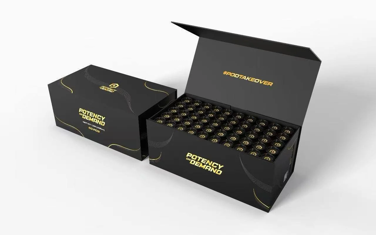 Open black box labeled 'Potency on Demand' containing small jars with golden labels, alongside a closed box with the same label.