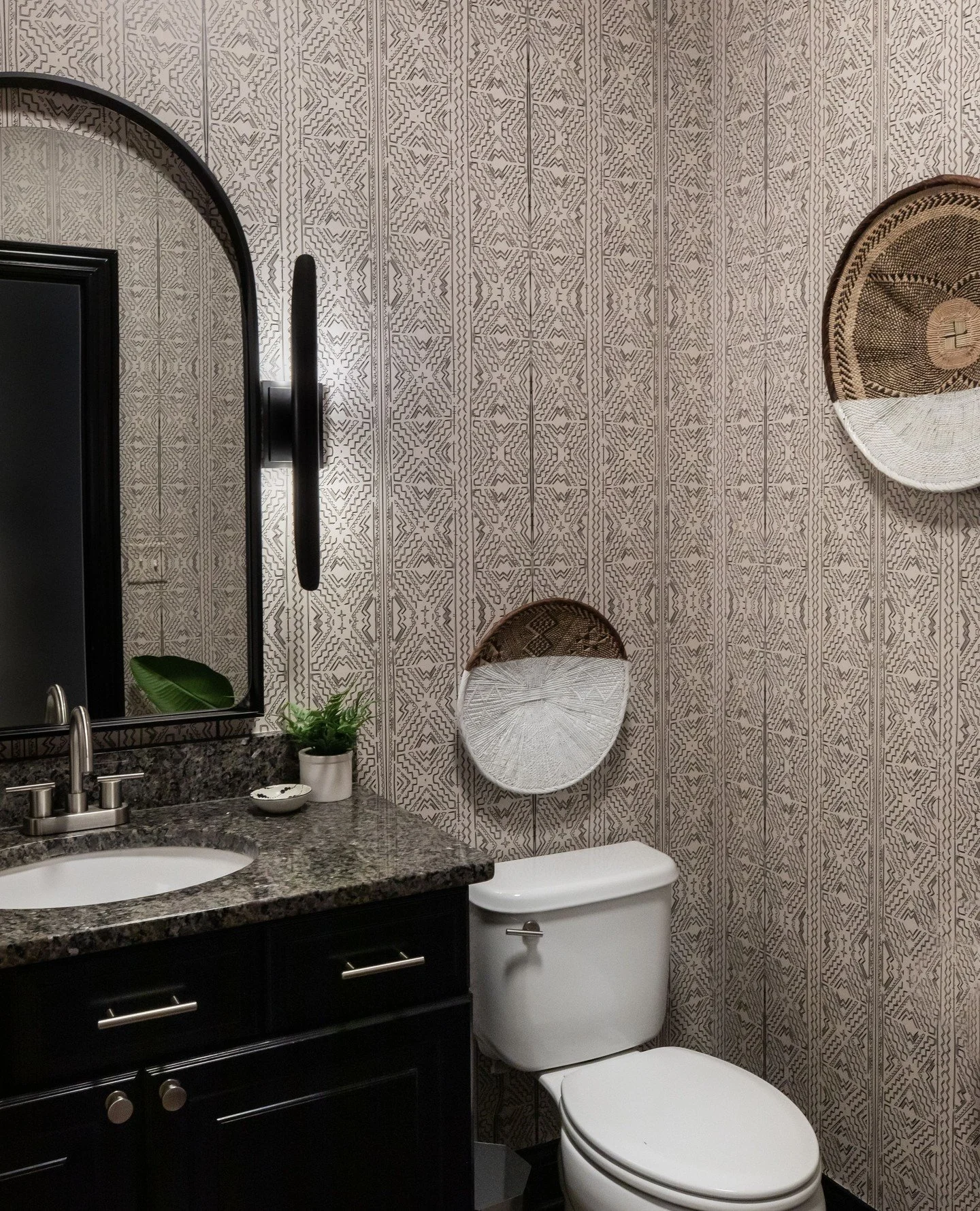 Our bathroom makeover features stunning dark wood accents that bring warmth and elegance to this space, perfectly complementing the modern fixtures and sleek design. Swipe to see the before and after shots of this well-planned renovation!⁠
⁠
#Bathroo