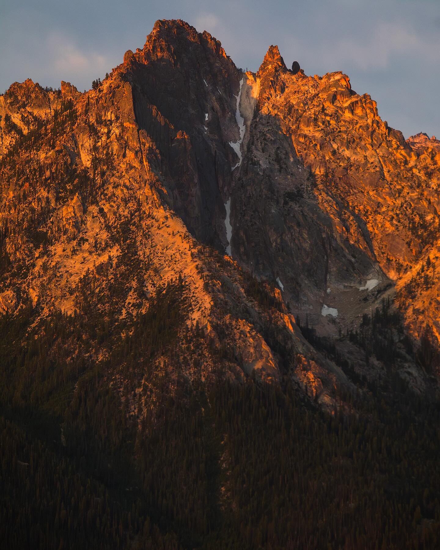Alpenglow on The Grand Mogul | 08&bull;01&bull;22

I&rsquo;ve been practicing high contrast images for a while now. The trickiest part about an image like this is haze. Unwanted color can manifest in the dark shadows. For this image, a &ldquo;classic