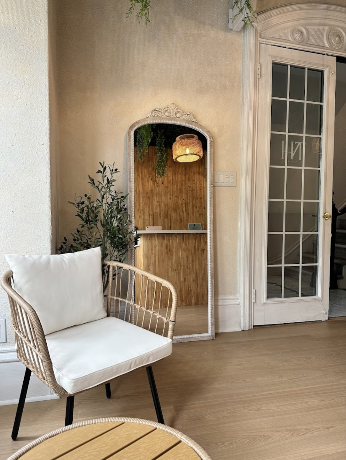 Interior architectural detail in Hess Village nail salon highlighting feature wall and material palette
