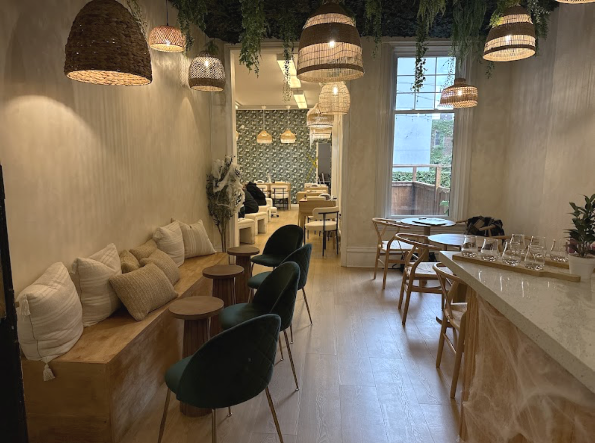 Reception and service counter area at Nail Salon in Hess Village, Hamilton designed by SODA architects
