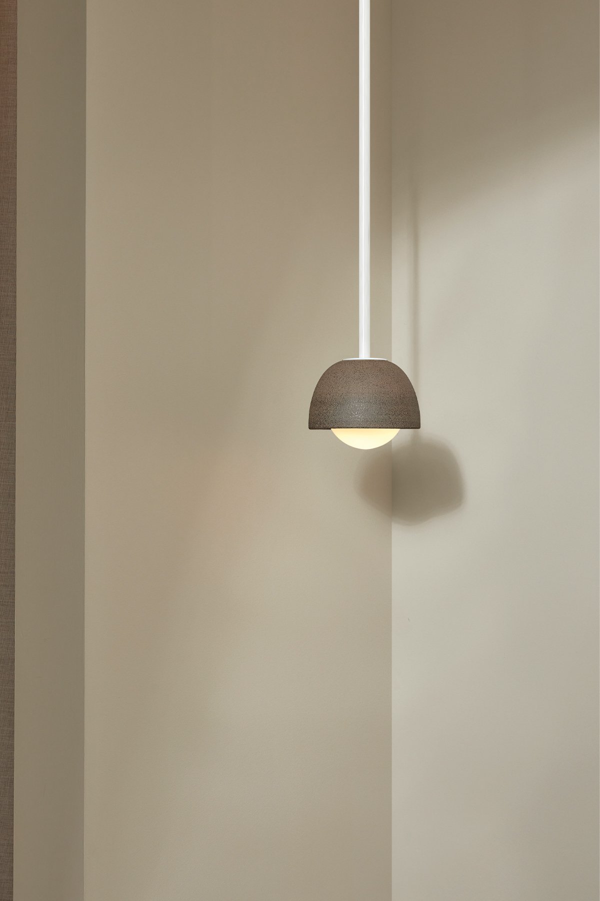 Marz Designs_Terra 0 Pendant_Clay_White Satin_Opal_Solid Rod_On_Colour Corrected_Portrait_.jpg