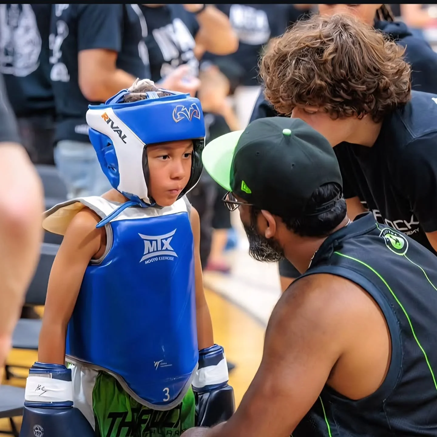 This young warrior julius right before his fight. Fearless. This kid trained hard and battled  adversity. The entire crowd was there for the other kid. He ignored the noise and got the job done! Amazing work!
#leasidemartialarts #leasidemuaythai #lea