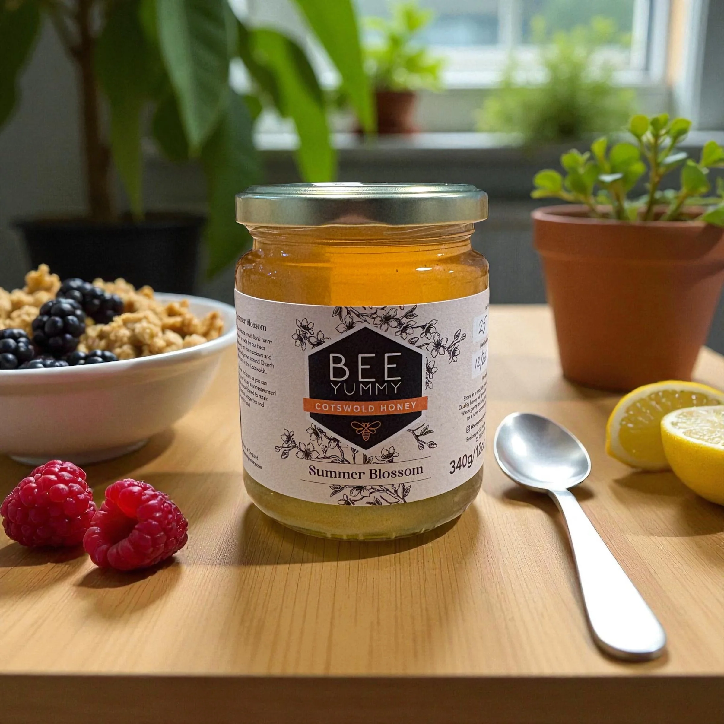 Bee Yummy Summer Blossom Cotswold Honey jar with berries, granola and lemon.