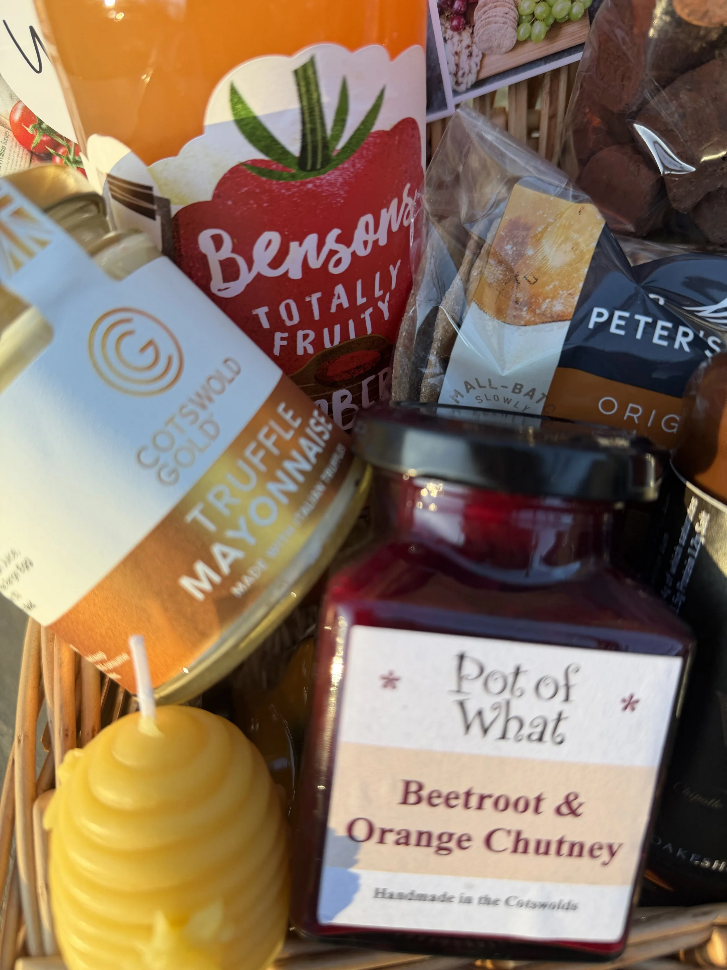 Truffle mayonnaise, beetroot and orange chutney, and honey inside the Cotswold hamper.
