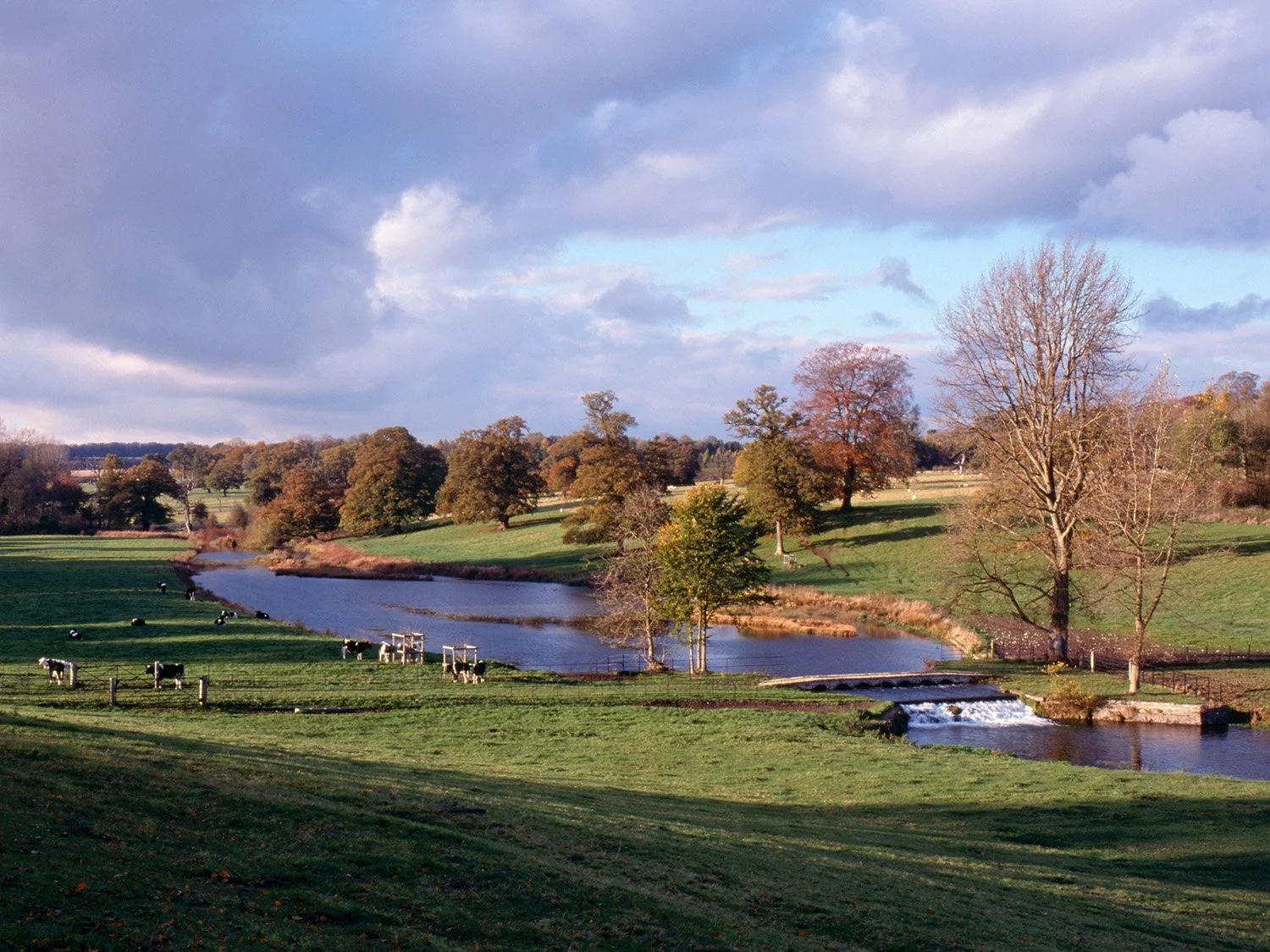 River winding through open countryside near Sherborne in the Cotswolds.