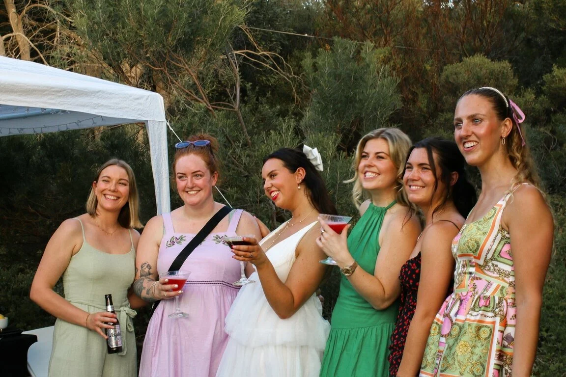 Engaged couple celebrating with guests at a Melbourne wedding catered by VERTA Events