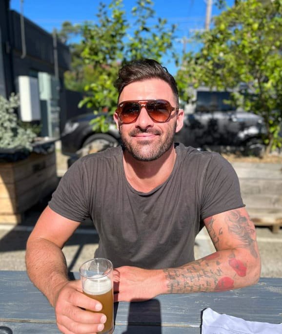 Smiling man in sun Topless Waiter Melbourne.jpg