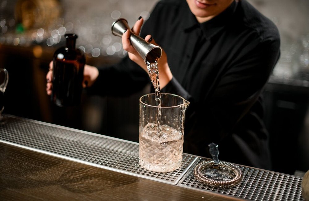 Mixologist bartender making a cocktail in Melbourne for VERTA events