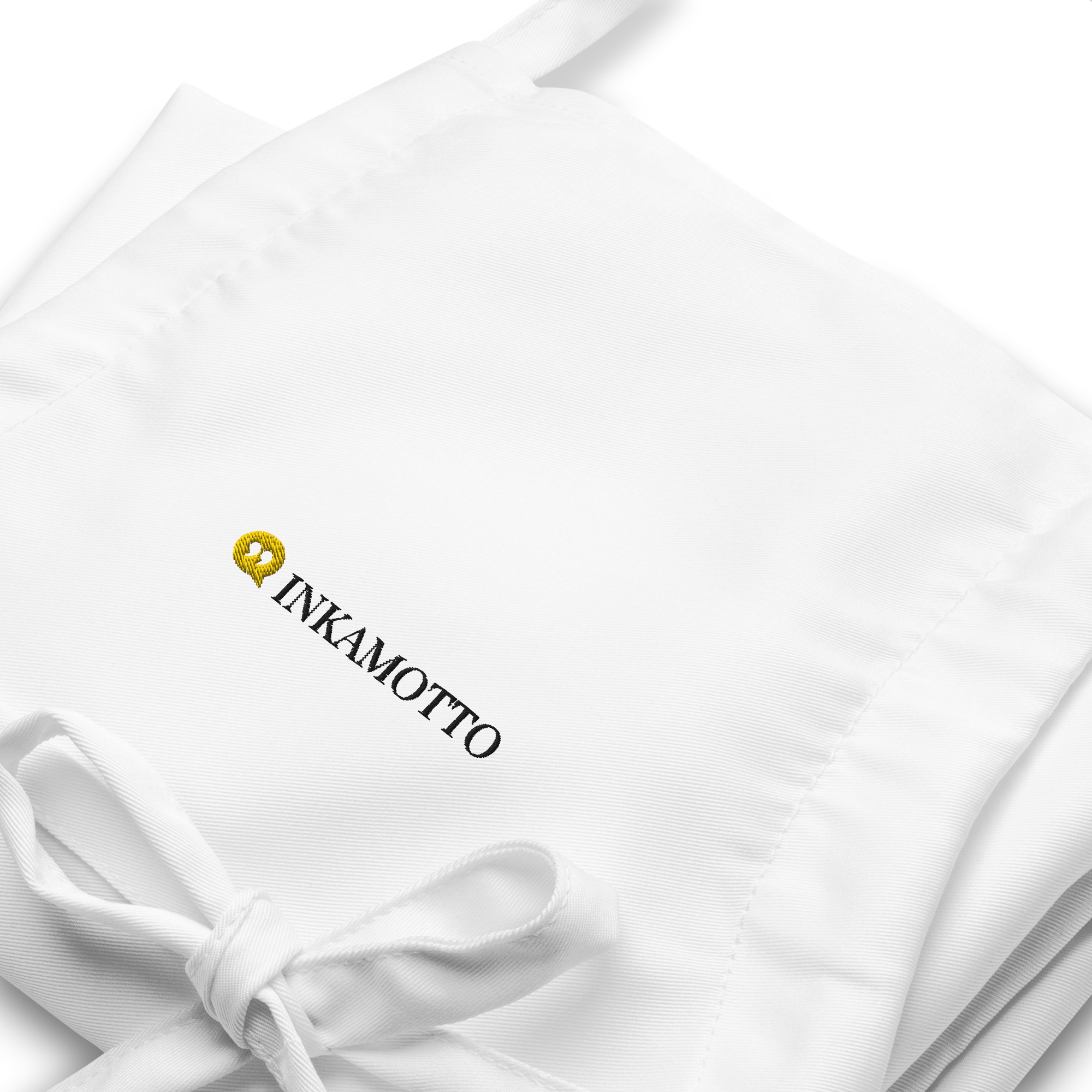 embroidered-apron-white-zoomed-in-65d191523eab6.png
