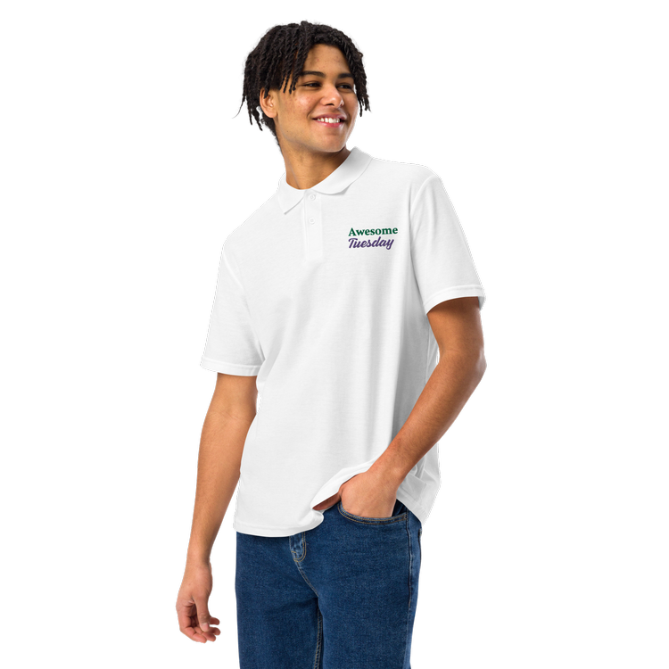 Person wearing white polo shirt with custom print 'Awesome Tuesday', showcasing his mastery of keeping a positive outlook and inspiring others.