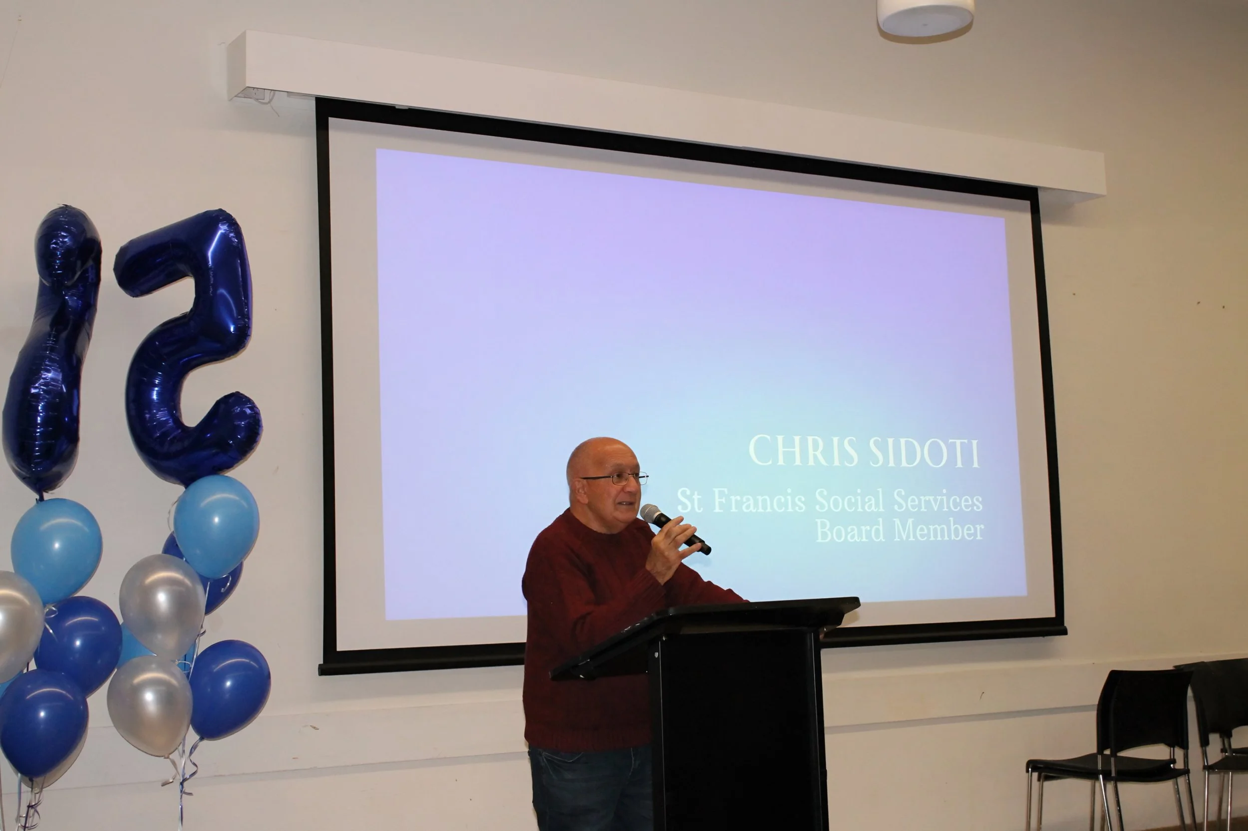 house-of-welcome-25-year-anniversary-chris-sidoti-speaking.jpeg