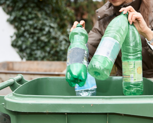 Recyling plastic bottles in the recycle bin
