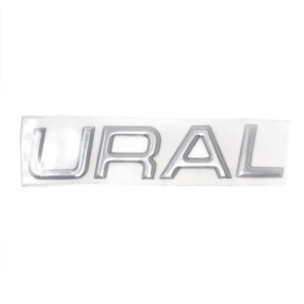 Insignia del depósito URAL con letras en relieve plateadas