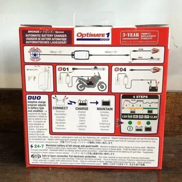 El cargador de batería Optimate 1 (12 V, 0,4 A) es un accesorio para los sidecares Ural disponible a través de Moto Side Aventure, concesionario de sidecares Ural