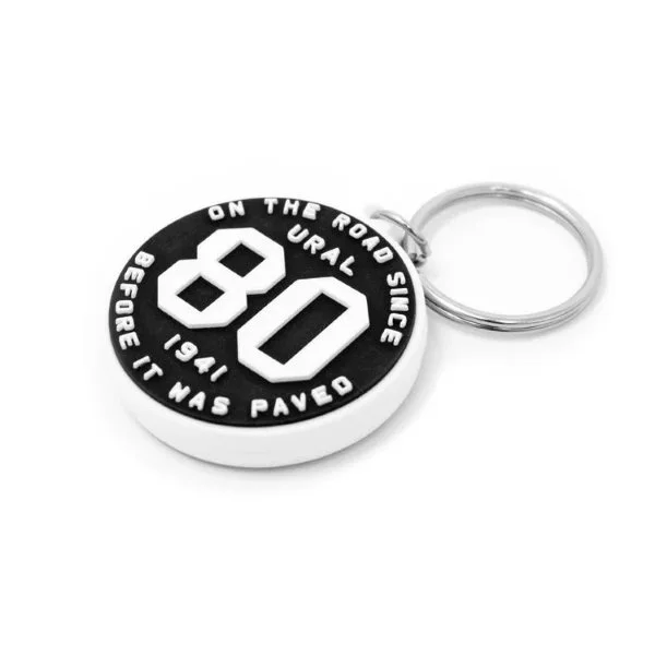 Llavero de goma con el logotipo del 80.º aniversario