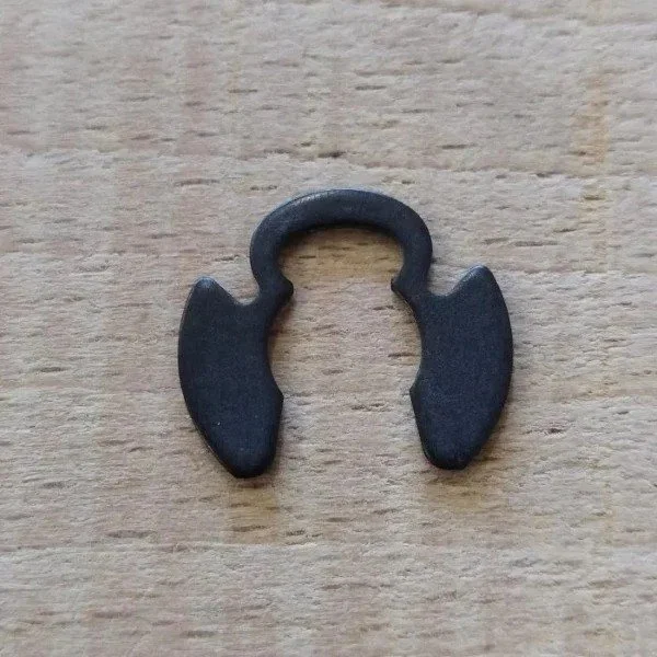 Anillo de retención del eje de las pastillas traseras