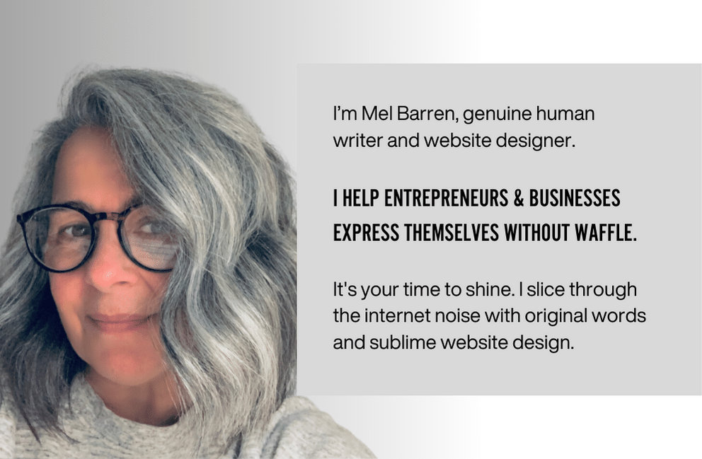 Headshot of Mel Barren of Wordy Girl Design on grey background. She is a writer and blogger with grey silver hair and glasses.
