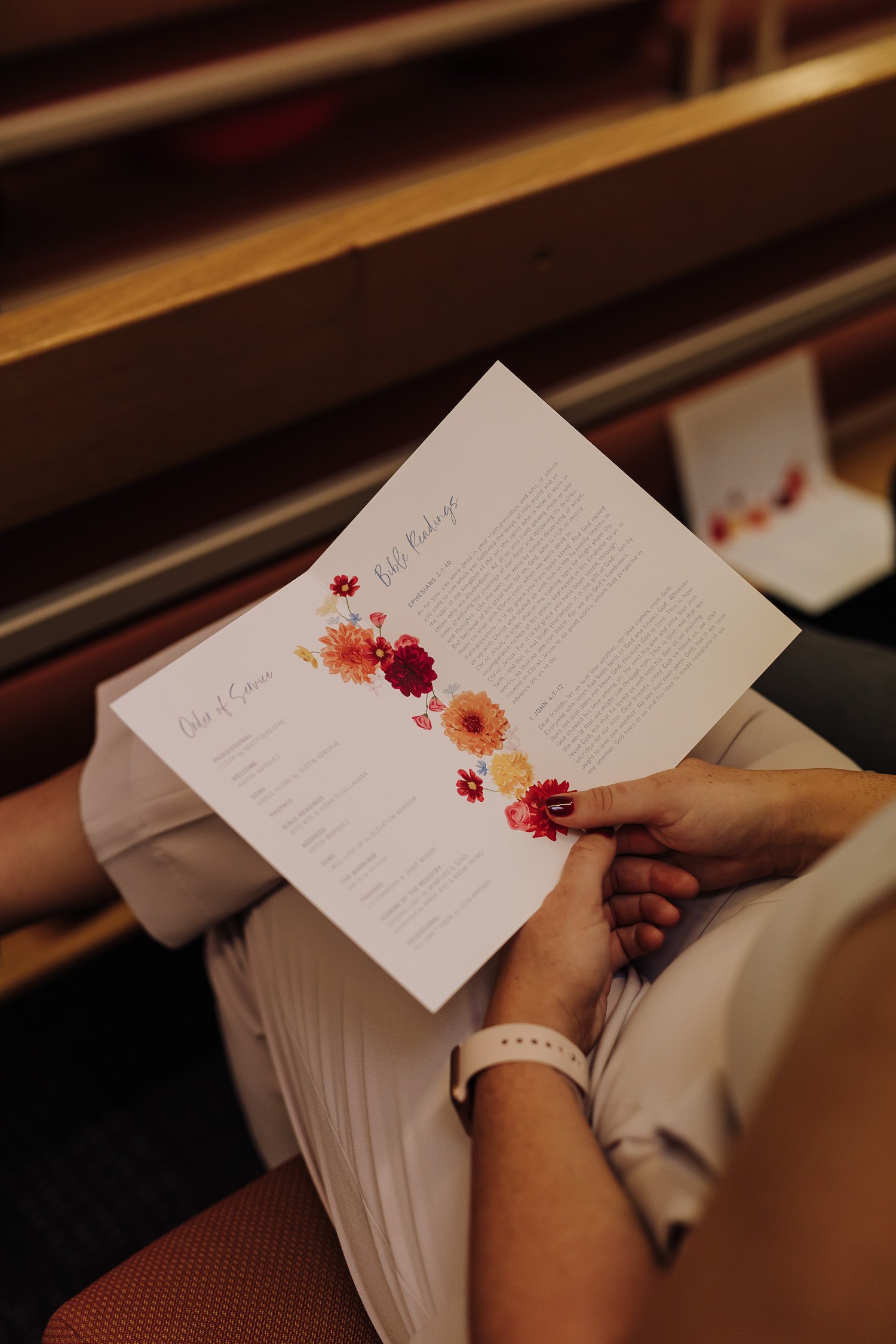 Colourful flowers in centre fold of order of service