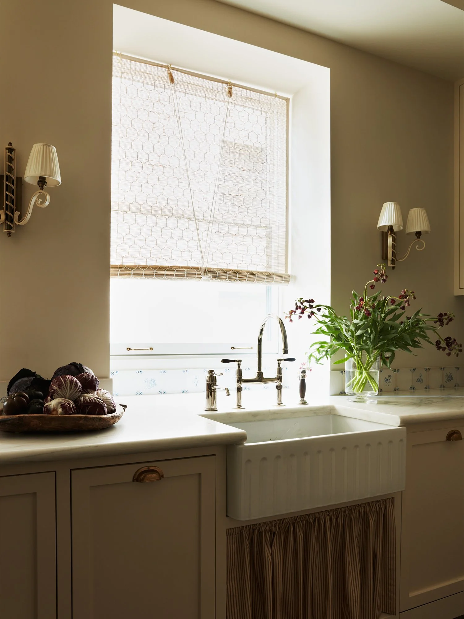 View of kitchen sink and counters.