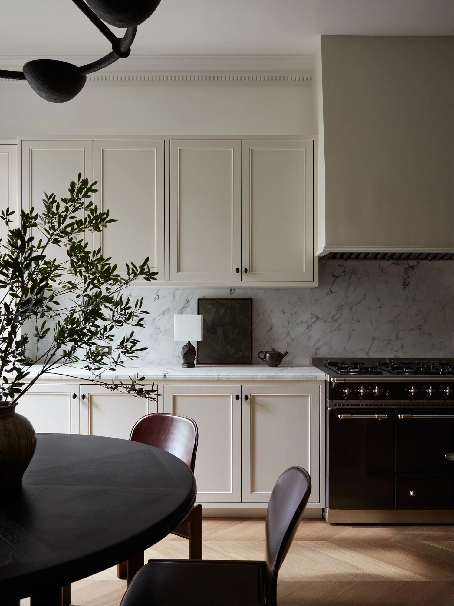 Breakfast table and kitchen.