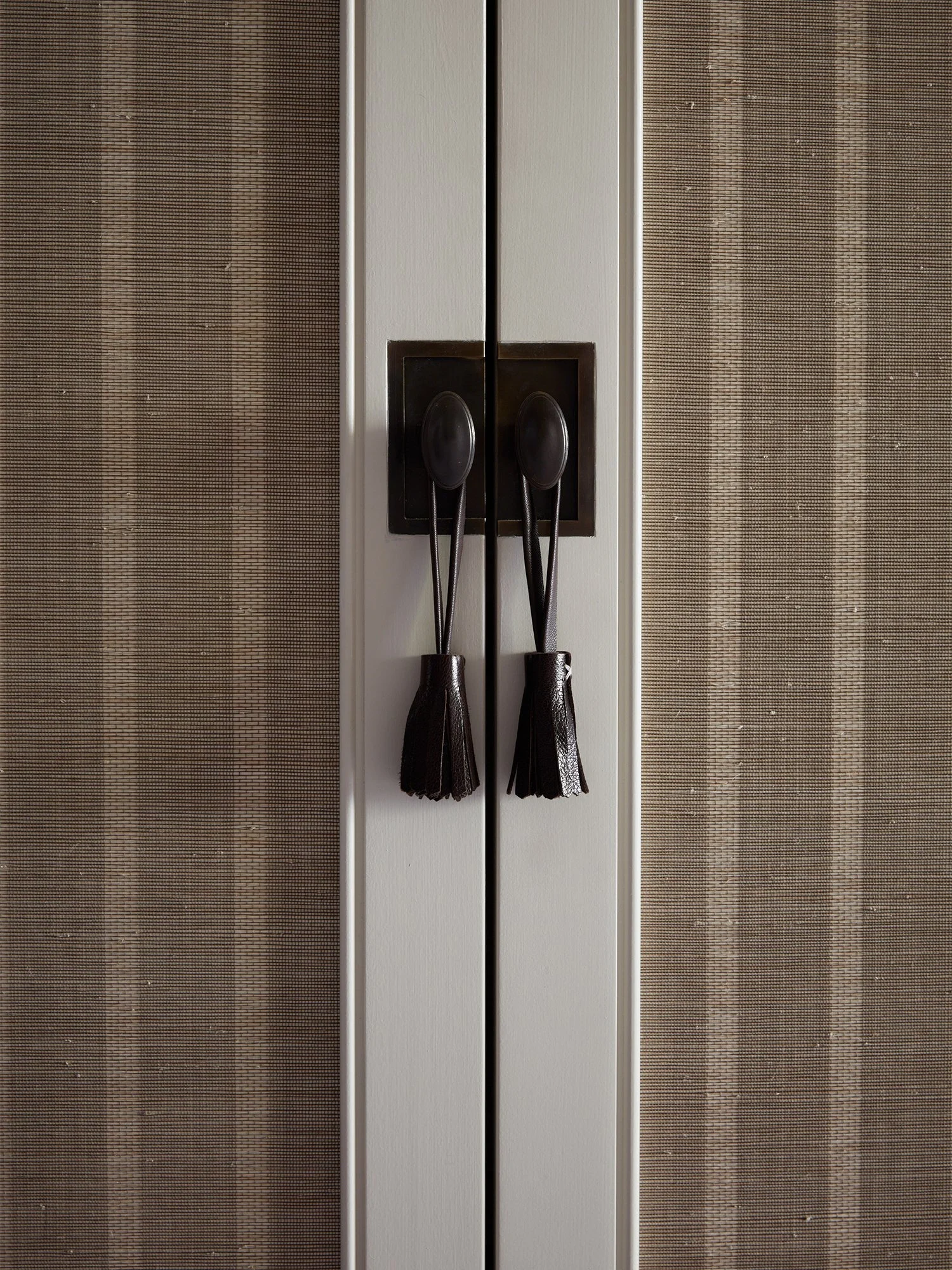 Detail of wardrobe handles.