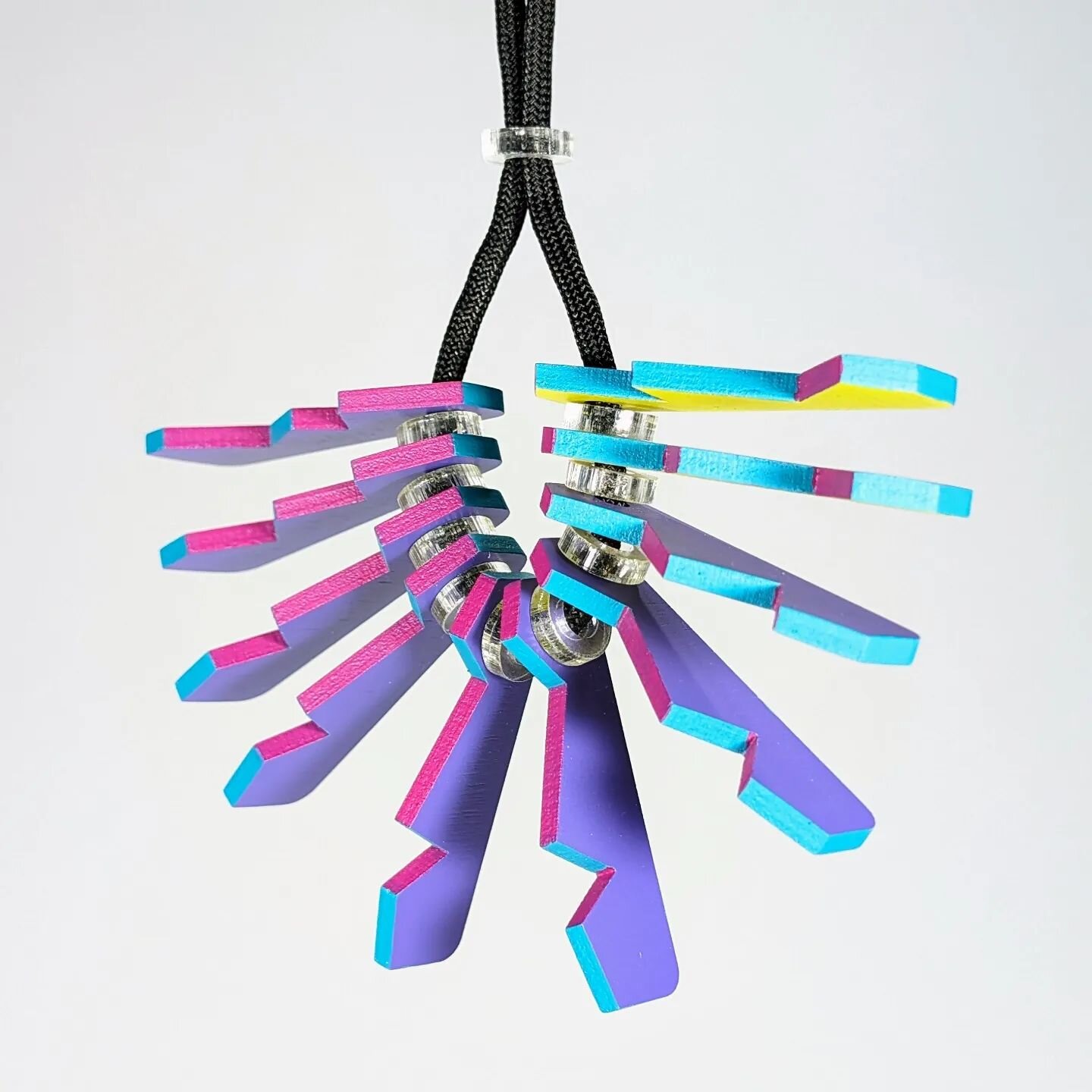 Another colour way - Purple, Yellow Green, Green Blue, Magenta

🟣🔵 Available on Etsy now! Etsy link can be found within my Bio. Product details below 🔴🟠

The Umbra Lux: Furl necklace, crafted in a small workshop in South West Wales, its distincti