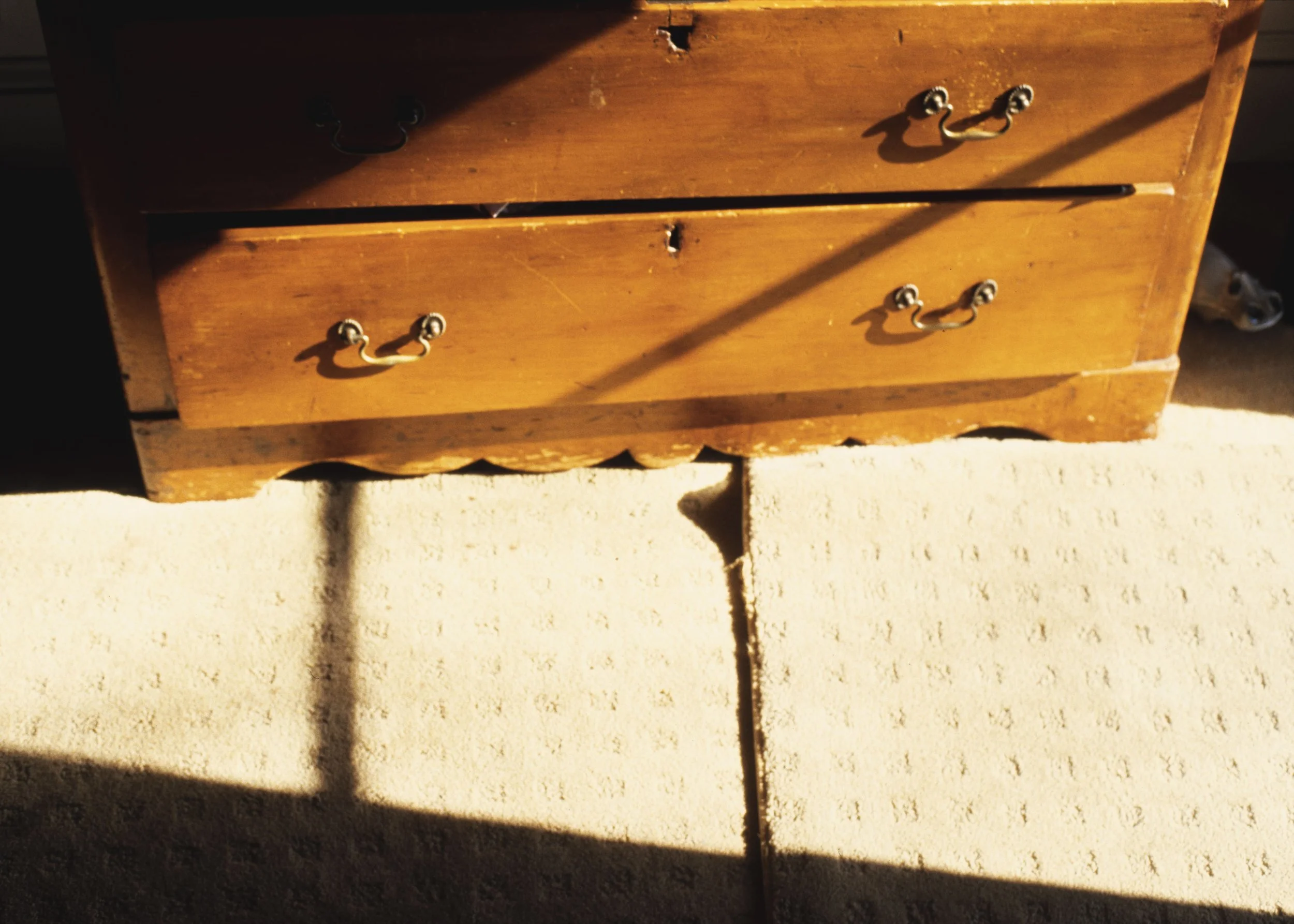 zoomed in bottom of moms dresser 3rd floor.jpg