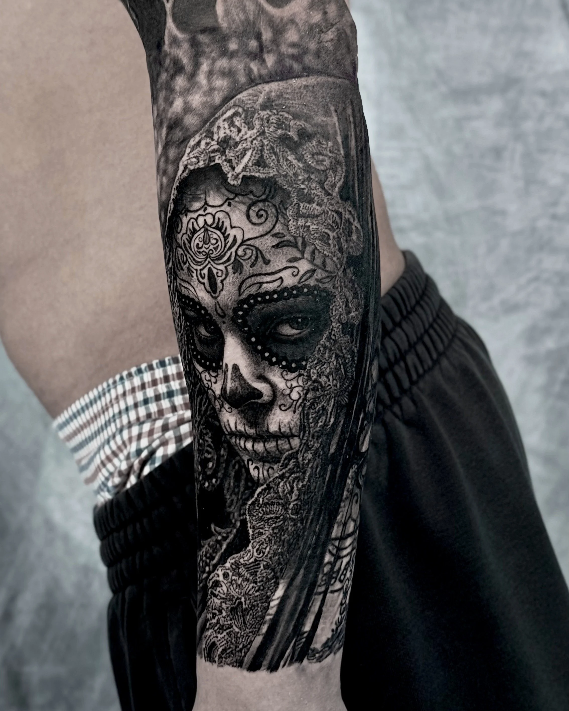 Day of the Dead woman realism tattoo on the forearm by Etgar Oak