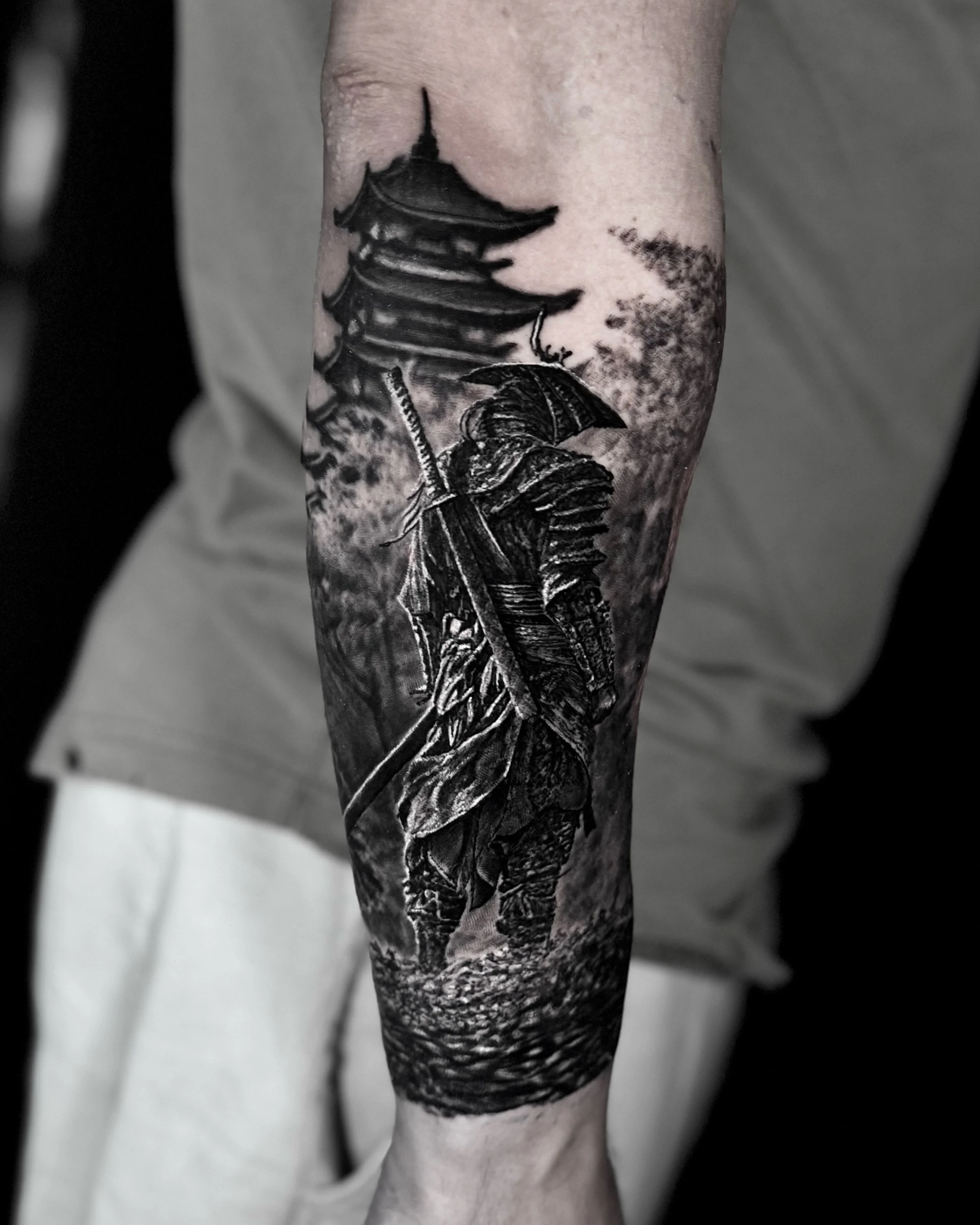 Samurai and pagoda realism tattoo on the forearm by Etgar Oak