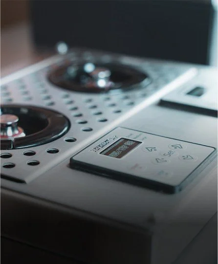 Close-up of a ReverseTap low-profile beer dispenser, buttons, and a display screen.