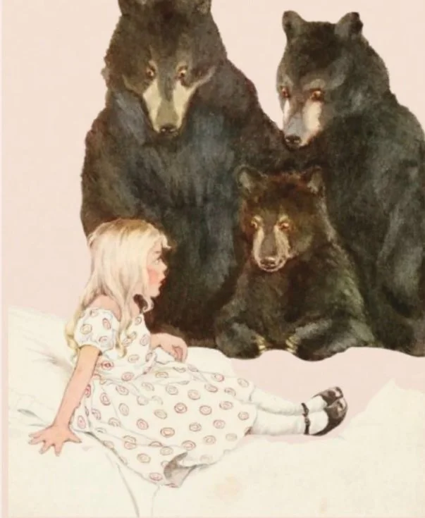 Illustration of a young girl with three bears, likely depicting a scene from the story 'Goldilocks and the Three Bears'. The girl, sitting on a bed, looks at the bears.