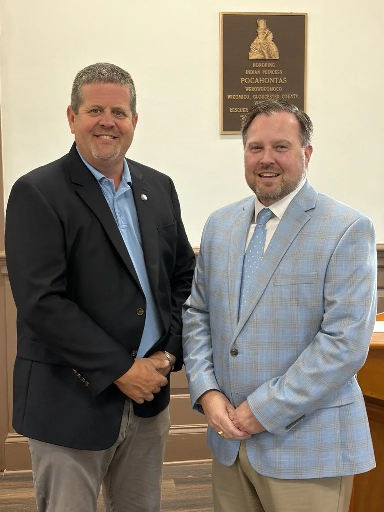 Two men wearing sports jackets