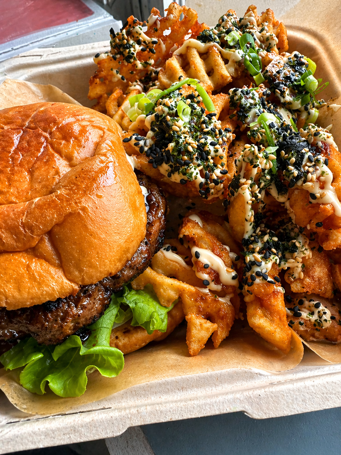 Hawaiian teriyaki burger served with furikake topped waffle fries