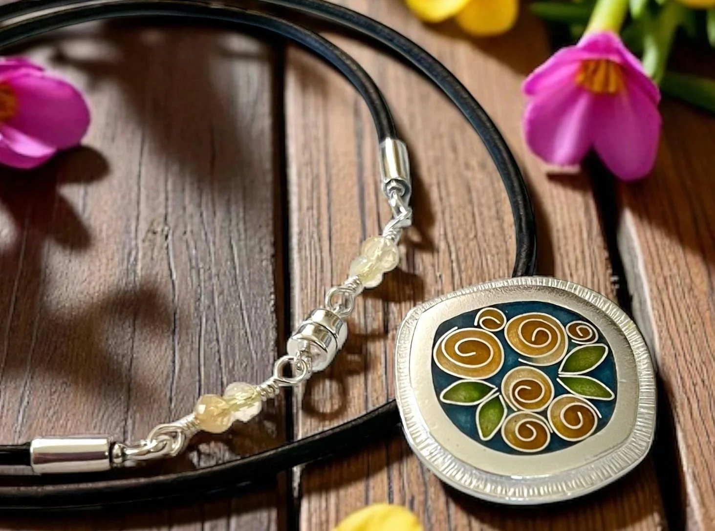 Kara Hickey  I create one of a kind cloisonné enamel and gemstone jewelry. Each piece is designed, handcrafted and enameled in my home studio in Medford, Ma.   