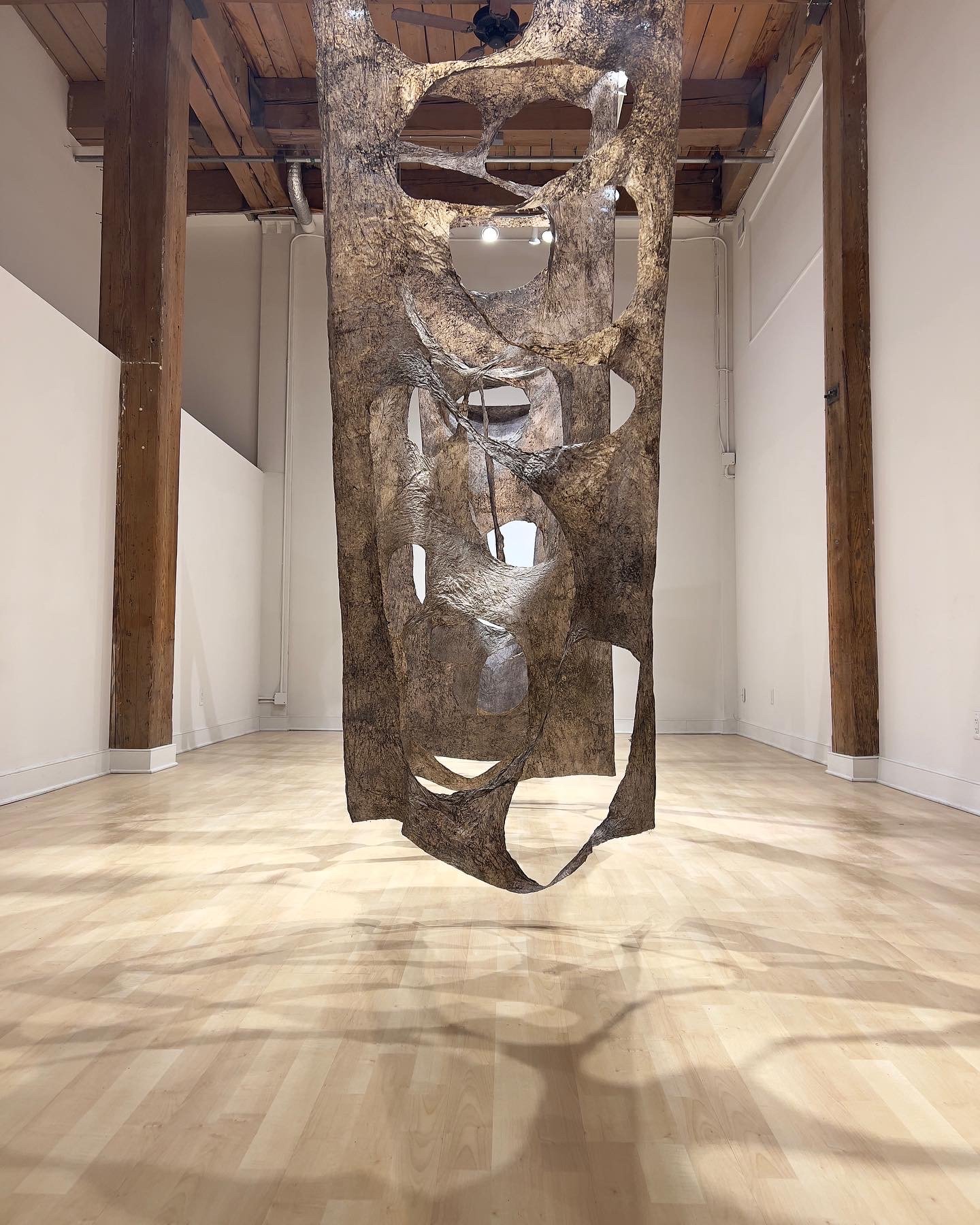 Bog Etude No. 1, 6 panels 108 x 42 ", peace silk, bog mud dye, bog mud, thread, wax, Form+Content Gallery exhibition installation, 2023 