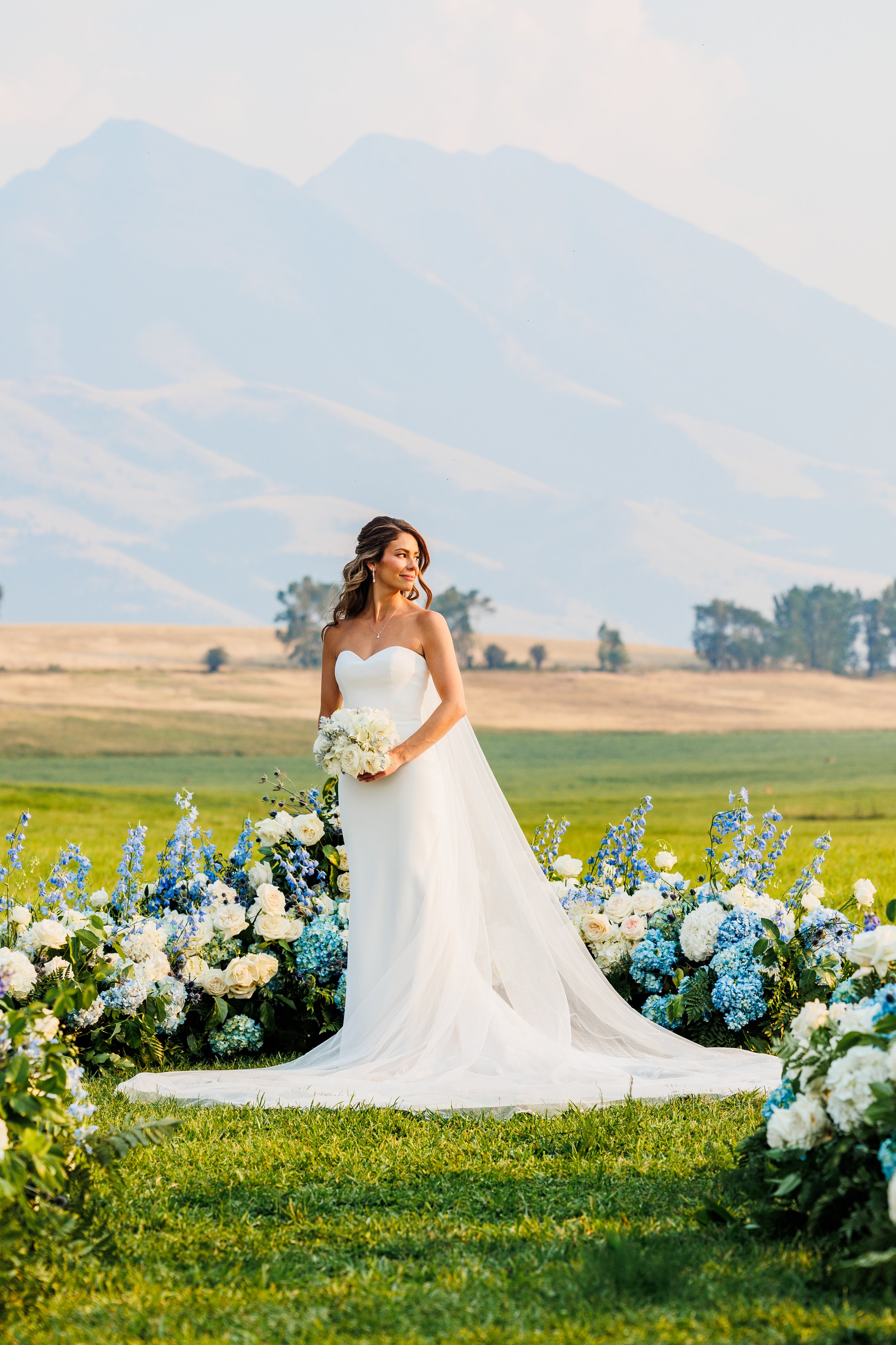 Sage Lodge Montana Destination Wedding Ceremony Wedding Flowers Blue and White