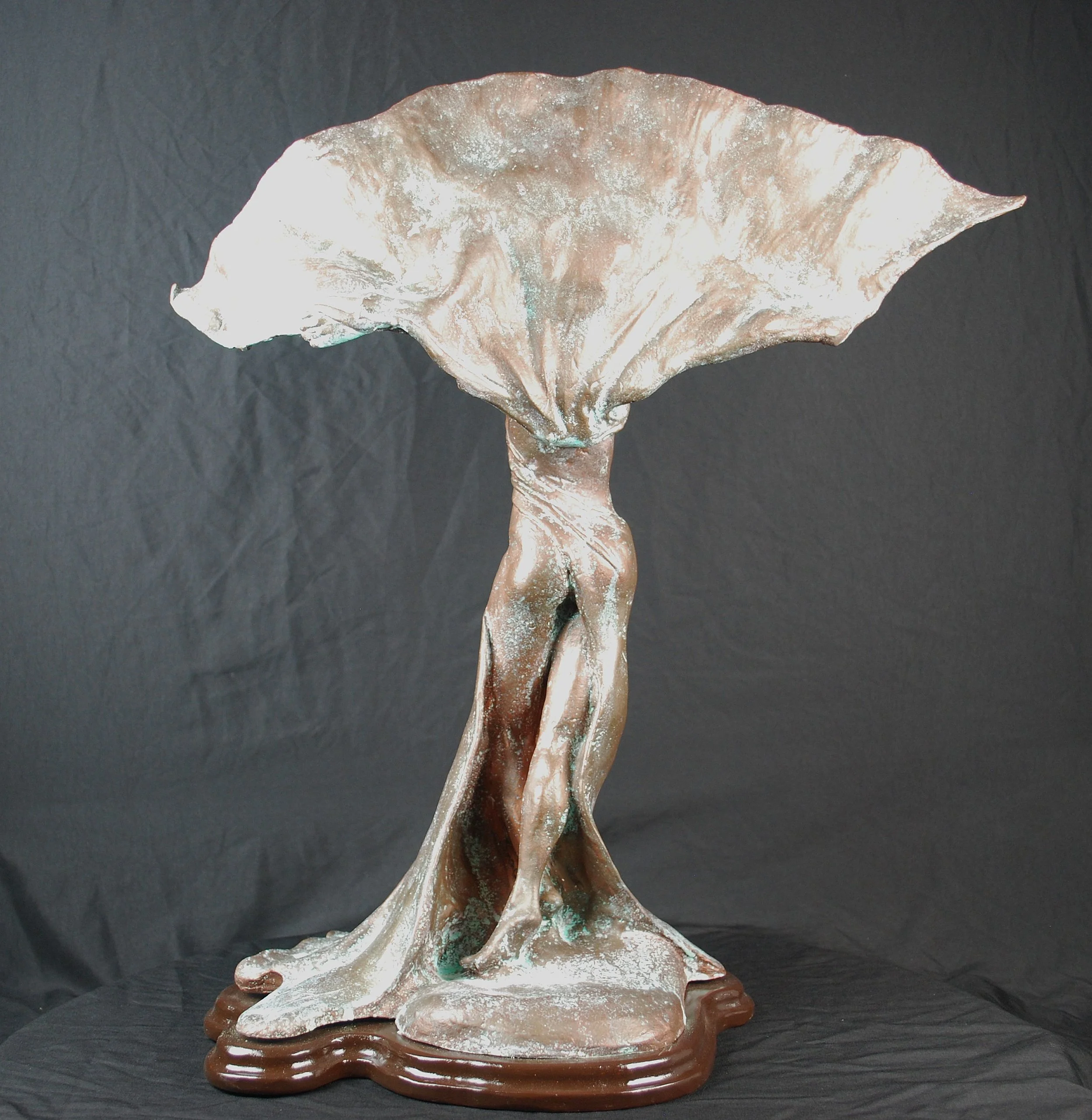 Flourish sculpture by Sharon Cruson, copper-infused figurative sculpture with sweeping fan-like form