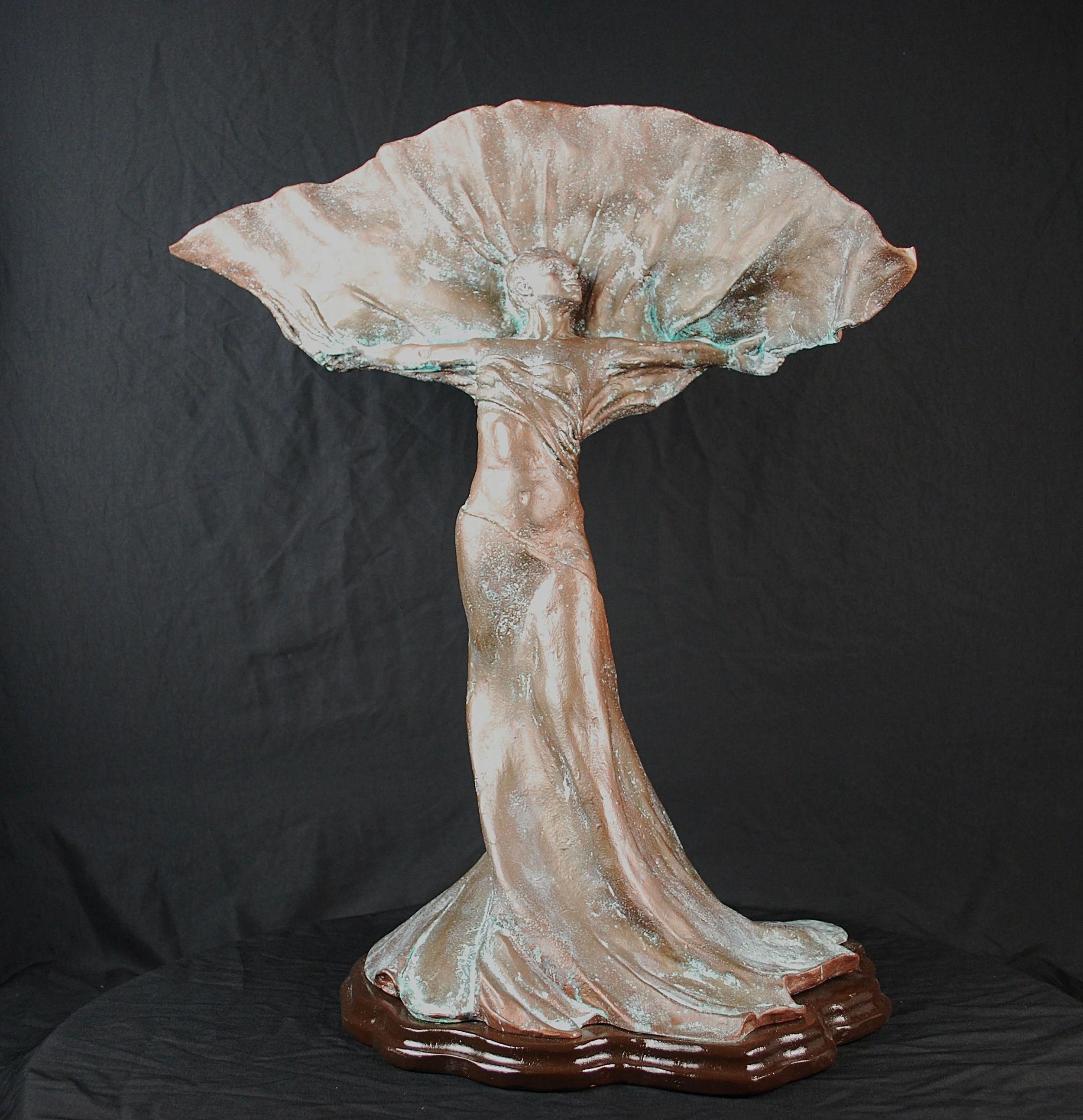 Flourish sculpture by Sharon Cruson, copper-infused figurative sculpture with sweeping fan-like form