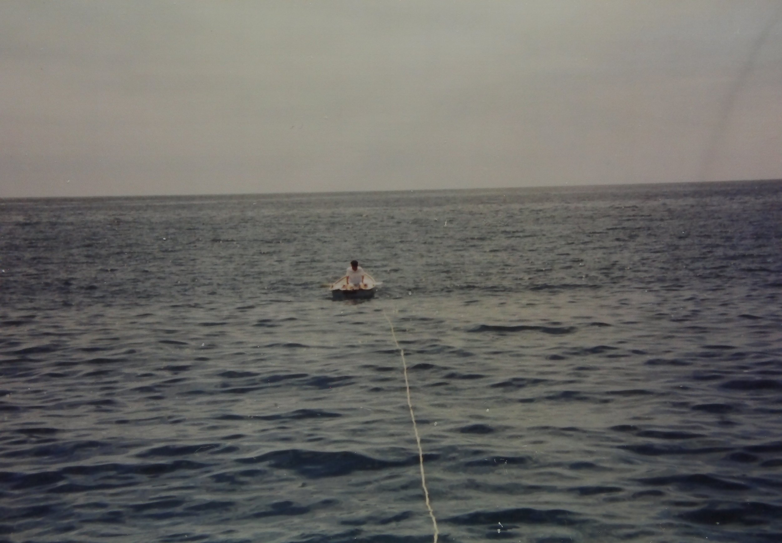 Dad dropping rear anchor, Catalina 94.JPG