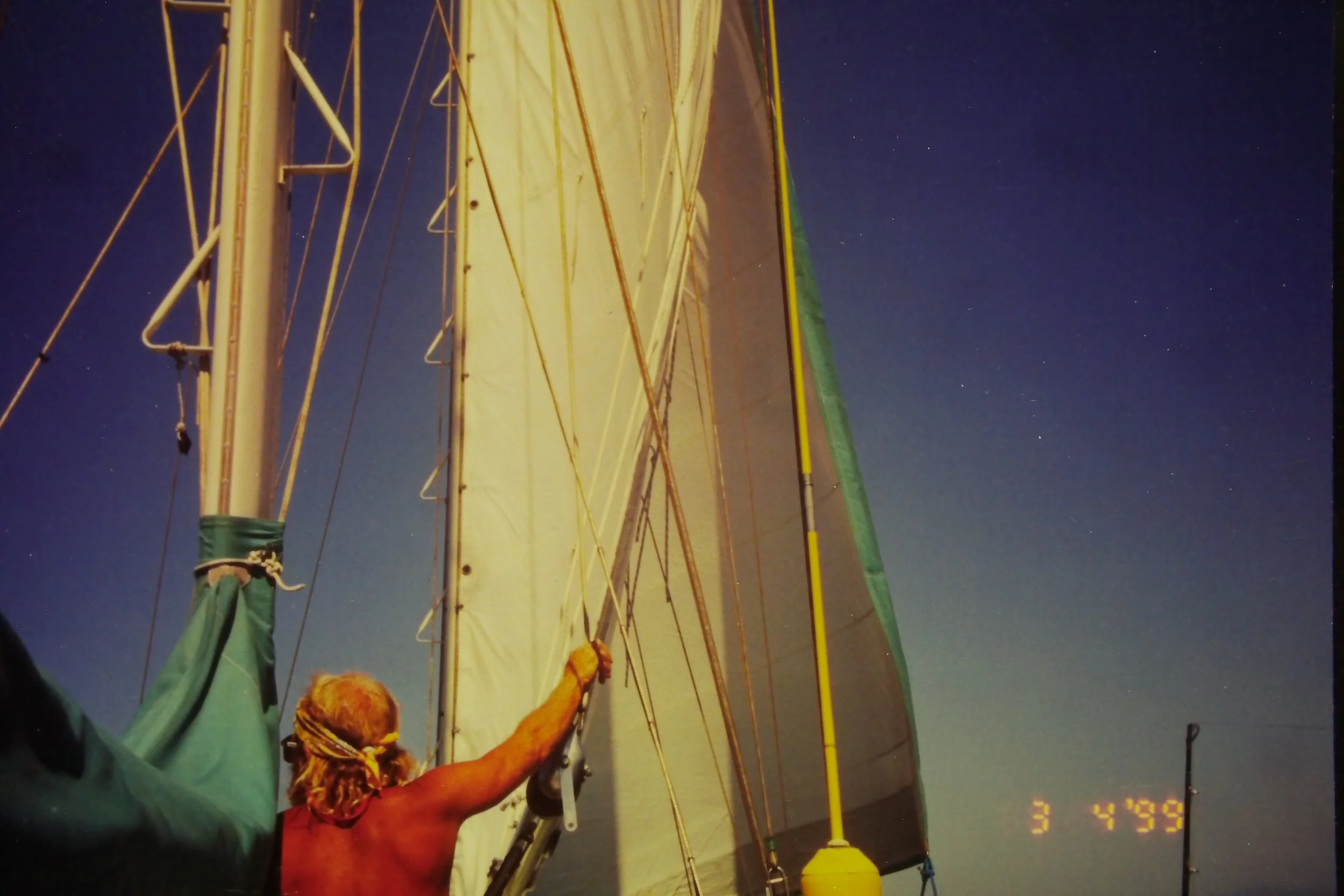 3.4.99 Dad adjusting sails, Banderas Bay.JPG
