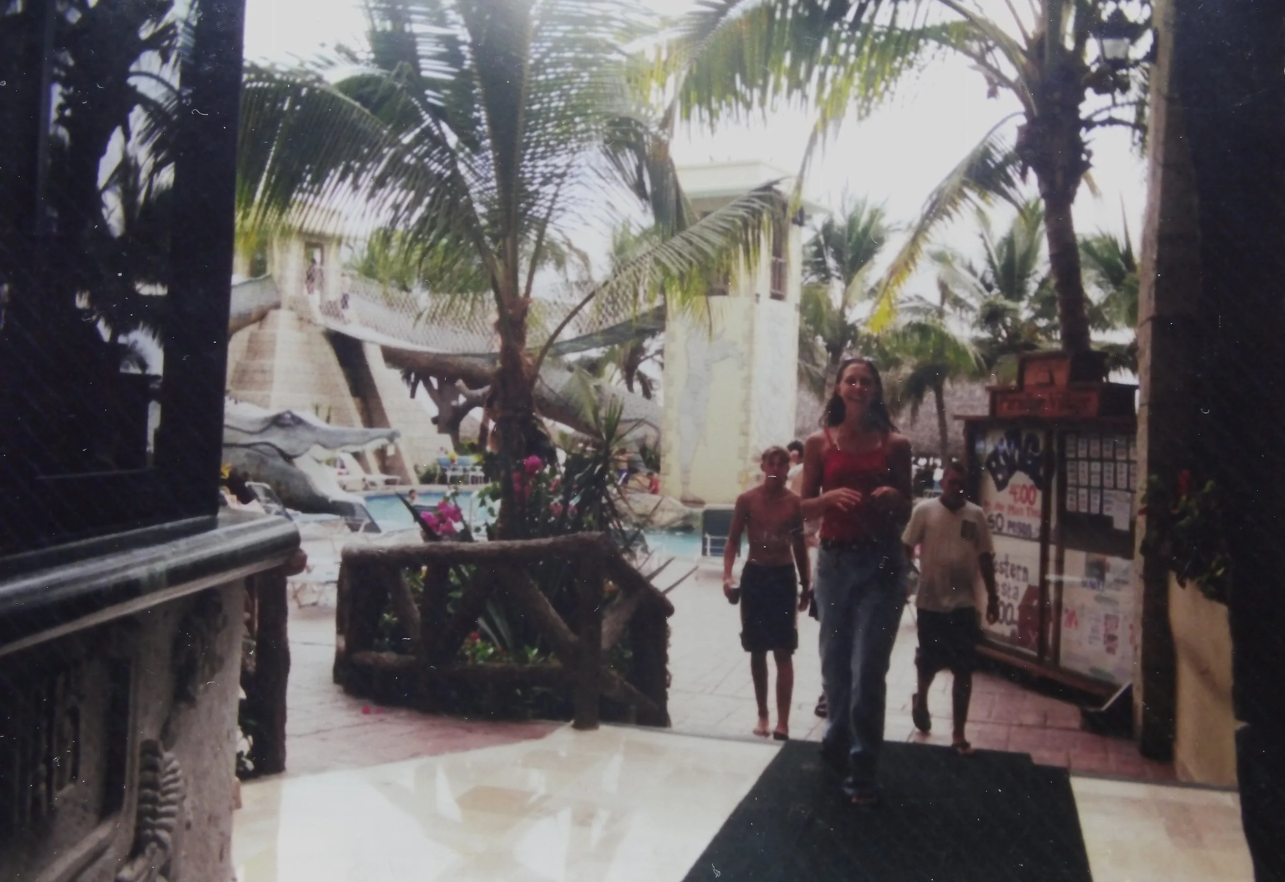  Alec, Meghan and Shaun coming into the hotel from the pool area. 